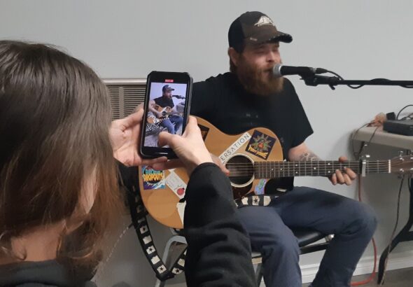 Sean Merritt and Sara Fisher of the Birdfolk Buskers deliver a high-energy set to a packed house at Dyment Recreation Hall during the Family Day festivities.