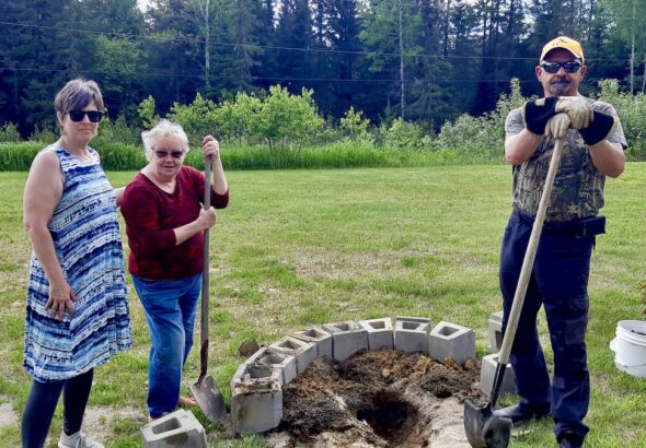 Leanne Nicholson, Terri Bell, and Pat Daignault spent the afternoon at Dyment Recreation Hall Park in Melgund Township, Northwestern Ontario, taking part in a hands-on community effort to strengthen local recreation space through garden development and tree planting.